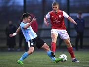 15 January 2023; Thijs Timmermans of St Patrick's Athletic is tackled by Michael Leddy of Drogheda United during the pre-season friendly match between St Patrick's Athletic and Drogheda United at the TU Dublin Blanchardstown in Dublin. Photo by Tyler Miller/Sportsfile