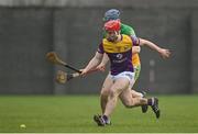 15 January 2023; Ross Banville of Wexford in action against Cathal Kiely of Offaly during the Walsh Cup Group 2 Round 2 match between Offaly and Wexford at St Brendan's Park in Birr, Offaly. Photo by Seb Daly/Sportsfile