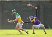 15 January 2023; John Murphy of Offaly in action against Charlie McGuckin of Wexford during the Walsh Cup Group 2 Round 2 match between Offaly and Wexford at St Brendan's Park in Birr, Offaly. Photo by Seb Daly/Sportsfile