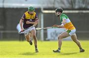 15 January 2023; Richie Lawlor of Wexford in action against Jason Sampson of Offaly during the Walsh Cup Group 2 Round 2 match between Offaly and Wexford at St Brendan's Park in Birr, Offaly. Photo by Seb Daly/Sportsfile