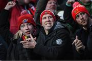 14 January 2023; Munster supporters celebrate a try during the Heineken Champions Cup Pool B Round 3 match between Munster and Northampton Saints at Thomond Park in Limerick. Photo by Tyler Miller/Sportsfile