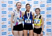 14 January 2023; Junior women's triple jump medallists, Emma O'Neill of Carrick-on-Suir AC, Waterford, gold, Molly Mullally of Dundrum South Dublin AC, silver, and Caoimhe Mc Donagh of South Sligo AC, bronze, during the 123.ie National Junior and U23 Indoor Athletics Championships at the National Indoor Arena in Dublin. Photo by Sam Barnes/Sportsfile