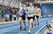 14 January 2023; Oisin Davis of Craughwell AC, Galway, right, and Michael Murphy of Tullamore Harriers AC, Offaly, competing in the under 23 men's 1500m during the 123.ie National Junior and U23 Indoor Athletics Championships at the National Indoor Arena in Dublin. Photo by Sam Barnes/Sportsfile