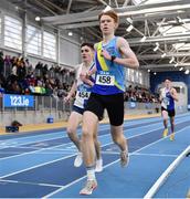 14 January 2023; Jack Mc Mahon of Ballyroan Abbeyleix and District AC, right, and Jack Donegan of Tullamore Harriers AC, Offaly, compete in the junior men's 1500m during the 123.ie National Junior and U23 Indoor Athletics Championships at the National Indoor Arena in Dublin. Photo by Sam Barnes/Sportsfile