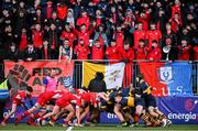 17 January 2023; CUS supporters cheer their side on in the scrum during the Bank of Ireland Vinnie Murray Cup Second Round match between CUS and The King’s Hospital at Energia Park in Dublin. Photo by Ben McShane/Sportsfile