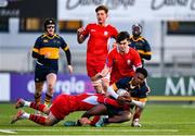 17 January 2023; Faizal Omotayo of The King's Hospital is tackled by Jack Grant of CUS during the Bank of Ireland Vinnie Murray Cup Second Round match between CUS and The King’s Hospital at Energia Park in Dublin. Photo by Ben McShane/Sportsfile