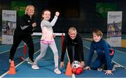 18 January 2023; Community Games and Sport Ireland Coaching today certified new tutors for their Coaching Children programme. Pictured are newly certified leader tutors Naomi Quinlivan Delaney, left, and Marian Boylan, with young athletes Emily Moylan, age 9, and her brother Jack, age 12, from Dublin, at the National Indoor Arena in Dublin. Photo by Seb Daly/Sportsfile