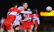 11 January 2023; Niall Sludden of Tyrone and Padraig McGrogan of Derry during the Bank of Ireland Dr McKenna Cup Round 3 match between Derry and Tyrone at Derry GAA Centre of Excellence in Owenbeg, Derry. Photo by Ben McShane/Sportsfile