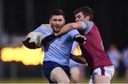 19 January 2023; David Garland of UCD in action against Colin Murray of University of Galway during the Electric Ireland Higher Education GAA Sigerson Cup Round 2 match between University College Dublin and University of Galway at Billings Park in Belfield, Dublin. Photo by Seb Daly/Sportsfile