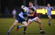 19 January 2023; David Garland of UCD in action against Colin Murray of University of Galway during the Electric Ireland Higher Education GAA Sigerson Cup Round 2 match between University College Dublin and University of Galway at Billings Park in Belfield, Dublin. Photo by Seb Daly/Sportsfile