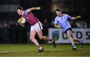 19 January 2023; Ger Davoren of University of Galway in action against Luke Breathnach of UCD during the Electric Ireland Higher Education GAA Sigerson Cup Round 2 match between University College Dublin and University of Galway at Billings Park in Belfield, Dublin. Photo by Seb Daly/Sportsfile