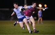 19 January 2023; Jonathan Lynam of UCD in action against Daniel Flaherty of University of Galway during the Electric Ireland Higher Education GAA Sigerson Cup Round 2 match between University College Dublin and University of Galway at Billings Park in Belfield, Dublin. Photo by Seb Daly/Sportsfile