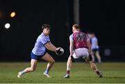 19 January 2023; Ben O’Carroll of UCD in action against Evan Lyons of University of Galway during the Electric Ireland Higher Education GAA Sigerson Cup Round 2 match between University College Dublin and University of Galway at Billings Park in Belfield, Dublin. Photo by Seb Daly/Sportsfile