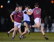 19 January 2023; Paddy O’Keane of UCD is tackled by Sean O’Flynn, left, and Paul Kelly of University of Galway during the Electric Ireland Higher Education GAA Sigerson Cup Round 2 match between University College Dublin and University of Galway at Billings Park in Belfield, Dublin. Photo by Seb Daly/Sportsfile
