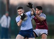19 January 2023; David Garland of UCD in action against Conor Dunleavy of University of Galway during the Electric Ireland Higher Education GAA Sigerson Cup Round 2 match between University College Dublin and University of Galway at Billings Park in Belfield, Dublin. Photo by Seb Daly/Sportsfile