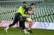20 January 2023; Ryan Baird is tackled by Harry Byrne during a Leinster Rugby captain's run at the Aviva Stadium in Dublin. Photo by Harry Murphy/Sportsfile