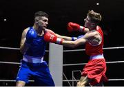 20 January 2023; Jason Nevin of Olympic Boxing Club, Westmeath, right, and Rhys Owens of Erne Boxing Club, Fermanagh, during their lightweight 60kg semi-final bout at the IABA National Elite Boxing Championships semi-finals at the National Boxing Stadium in Dublin. Photo by Seb Daly/Sportsfile