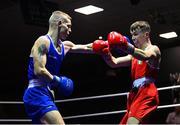 20 January 2023; Aaron O’Donohue of Golden Gloves Boxing Club, Cork, right, and Brandon McCarthy of St Michaels Boxing Club, Kildare, during their light welterweight 63.5kg semi-final bout at the IABA National Elite Boxing Championships semi-finals at the National Boxing Stadium in Dublin. Photo by Seb Daly/Sportsfile
