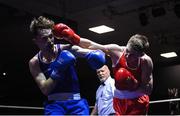20 January 2023; John Paul Hale of Star ABC, Belfast, right, and Dean Clancy of Sean McDermott Boxing Club, Leitrim, during their light welterweight 63.5kg semi-final bout at the IABA National Elite Boxing Championships semi-finals at the National Boxing Stadium in Dublin. Photo by Seb Daly/Sportsfile