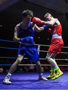 20 January 2023; John Paul Hale of Star ABC, Belfast, right, and Dean Clancy of Sean McDermott Boxing Club, Leitrim, during their light welterweight 63.5kg semi-final bout at the IABA National Elite Boxing Championships semi-finals at the National Boxing Stadium in Dublin. Photo by Seb Daly/Sportsfile