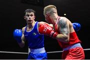20 January 2023; Wayne Kelly of Ballynacargy Boxing Club, Westmeath, right, and Eugene McKeever of Holy Family Drogheda Boxing Club, Louth, during their welterweight 67kg semi-final bout at the IABA National Elite Boxing Championships semi-finals at the National Boxing Stadium in Dublin. Photo by Seb Daly/Sportsfile