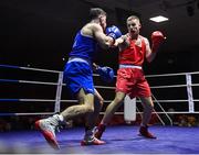 20 January 2023; Wayne Kelly of Ballynacargy Boxing Club, Westmeath, right, and Eugene McKeever of Holy Family Drogheda Boxing Club, Louth, during their welterweight 67kg semi-final bout at the IABA National Elite Boxing Championships semi-finals at the National Boxing Stadium in Dublin. Photo by Seb Daly/Sportsfile