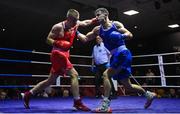 20 January 2023; Wayne Kelly of Ballynacargy Boxing Club, Westmeath, left, and Eugene McKeever of Holy Family Drogheda Boxing Club, Louth, during their welterweight 67kg semi-final bout at the IABA National Elite Boxing Championships semi-finals at the National Boxing Stadium in Dublin. Photo by Seb Daly/Sportsfile