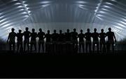 20 January 2023; Mayo players stand for Amhrán na bhFiann before the Connacht FBD League Final match between Mayo and Roscommon at NUI Galway Connacht GAA Air Dome in Bekan, Mayo. Photo by Piaras Ó Mídheach/Sportsfile