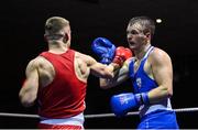 20 January 2023; Ryan McCarthy of Fr Horgan's Boxing Club, Cork, left, and Cian Reddy of Portlaoise Boxing Club, Laois, during their welterweight 67kg semi-final bout at the IABA National Elite Boxing Championships semi-finals at the National Boxing Stadium in Dublin. Photo by Seb Daly/Sportsfile