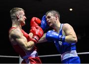 20 January 2023; Ryan McCarthy of Fr Horgan's Boxing Club, Cork, left, and Cian Reddy of Portlaoise Boxing Club, Laois, during their welterweight 67kg semi-final bout at the IABA National Elite Boxing Championships semi-finals at the National Boxing Stadium in Dublin. Photo by Seb Daly/Sportsfile