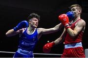 20 January 2023; Jon McConnell of Holy Trinity Boxing Club, Belfast, left, and Matthew McCole of Illies Golden Gloves Boxing Club, Donegal, during their light middleweight 71kg semi-final bout at the IABA National Elite Boxing Championships semi-finals at the National Boxing Stadium in Dublin. Photo by Seb Daly/Sportsfile
