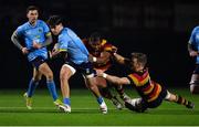 20 January 2023; James Tarrant of UCD is tackled by Temi Lasisi, left, and Jack O'Sullivan of Lansdowne during the Energia All-Ireland League Division 1A match between Lansdowne and UCD at Aviva Stadium in Dublin. Photo by Tyler Miller/Sportsfile