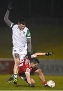 20 January 2023; Sean Powter of Cork is tackled by lain Corbett of Limerick during the McGrath Cup Final match between Cork and Limerick at Mallow GAA Grounds in Mallow, Cork. Photo by Eóin Noonan/Sportsfile