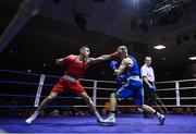 20 January 2023; Aidan Walsh of Emerald ABC, Belfast, left, and Dean Walsh of St Ibars/St Josephs Boxing Club, Wexford, during their light middleweight 71kg semi-final bout at the IABA National Elite Boxing Championships semi-finals at the National Boxing Stadium in Dublin. Photo by Seb Daly/Sportsfile