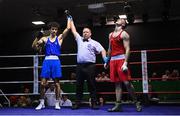 20 January 2023; Joshua Olaniyan of Jobstown Boxing Club, Dublin, left, celebrates after victory over Eoghin Lavin of Ballyhaunis Boxing Club, Mayo, right, during their middleweight 75kg semi-final bout at the IABA National Elite Boxing Championships semi-finals at the National Boxing Stadium in Dublin. Photo by Seb Daly/Sportsfile