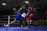 20 January 2023; Joshua Olaniyan of Jobstown Boxing Club, Dublin, left, and Eoghin Lavin of Ballyhaunis Boxing Club, Mayo, during their middleweight 75kg semi-final bout at the IABA National Elite Boxing Championships semi-finals at the National Boxing Stadium in Dublin. Photo by Seb Daly/Sportsfile