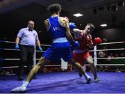 20 January 2023; Eoghin Lavin of Ballyhaunis Boxing Club, Mayo, right, and Joshua Olaniyan of Jobstown Boxing Club, Dublin, during their middleweight 75kg semi-final bout at the IABA National Elite Boxing Championships semi-finals at the National Boxing Stadium in Dublin. Photo by Seb Daly/Sportsfile