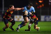 20 January 2023; Ben Brownlee of UCD is tackled by Tadgh McElroy, left, and Conor O'Sullivan of Lansdowne during the Energia All-Ireland League Division 1A match between Lansdowne and UCD at Aviva Stadium in Dublin. Photo by Tyler Miller/Sportsfile