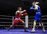 20 January 2023; Christopher O’Reilly of Holy Family Drogheda Boxing Club, Louth, left, and Gavin Rafferty of Dublin Docklands Boxing Club, Dublin, during their middleweight 75kg semi-final bout at the IABA National Elite Boxing Championships semi-finals at the National Boxing Stadium in Dublin. Photo by Seb Daly/Sportsfile
