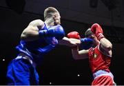 20 January 2023; Christopher O’Reilly of Holy Family Drogheda Boxing Club, Louth, right, and Gavin Rafferty of Dublin Docklands Boxing Club, Dublin, during their middleweight 75kg semi-final bout at the IABA National Elite Boxing Championships semi-finals at the National Boxing Stadium in Dublin. Photo by Seb Daly/Sportsfile