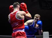 20 January 2023; Gavin Rafferty of Dublin Docklands Boxing Club, Dublin, right, and Christopher O’Reilly of Holy Family Drogheda Boxing Club, Louth, during their middleweight 75kg semi-final bout at the IABA National Elite Boxing Championships semi-finals at the National Boxing Stadium in Dublin. Photo by Seb Daly/Sportsfile