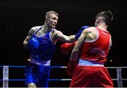 20 January 2023; Gavin Rafferty of Dublin Docklands Boxing Club, Dublin, left, and Christopher O’Reilly of Holy Family Drogheda Boxing Club, Louth, during their middleweight 75kg semi-final bout at the IABA National Elite Boxing Championships semi-finals at the National Boxing Stadium in Dublin. Photo by Seb Daly/Sportsfile