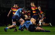 20 January 2023; Ruairi Clarke of Lansdowne is tackled by James Culhane, left, and Gus McCarthy of UCD during the Energia All-Ireland League Division 1A match between Lansdowne and UCD at Aviva Stadium in Dublin. Photo by Tyler Miller/Sportsfile