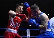 20 January 2023; Kane Tucker of Emerald ABC, Belfast, left, and Kyle Roche of St Michael's Boxing Club, Wexford, during their cruiserweight 86kg semi-final bout at the IABA National Elite Boxing Championships semi-finals at the National Boxing Stadium in Dublin. Photo by Seb Daly/Sportsfile