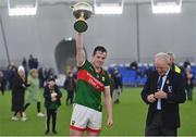 20 January 2023; Mayo captain Stephen Coen lifts the cup after his side's victory in the Connacht FBD League Final match between Mayo and Roscommon at NUI Galway Connacht GAA Air Dome in Bekan, Mayo. Photo by Piaras Ó Mídheach/Sportsfile