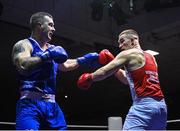20 January 2023; Wayne Rafferty of Dublin Docklands Boxing Club, Dublin, left, and Jack Marley of Monkstown Boxing Club, Dublin, during their heavyweight 92kg semi-final bout at the IABA National Elite Boxing Championships semi-finals at the National Boxing Stadium in Dublin. Photo by Seb Daly/Sportsfile