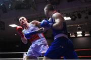 20 January 2023; Wayne Rafferty of Dublin Docklands Boxing Club, Dublin, right, and Jack Marley of Monkstown Boxing Club, Dublin, during their heavyweight 92kg semi-final bout at the IABA National Elite Boxing Championships semi-finals at the National Boxing Stadium in Dublin. Photo by Seb Daly/Sportsfile