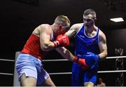 20 January 2023; Jack Marley of Monkstown Boxing Club, Dublin, left, and Wayne Rafferty of Dublin Docklands Boxing Club, Dublin, during their heavyweight 92kg semi-final bout at the IABA National Elite Boxing Championships semi-finals at the National Boxing Stadium in Dublin. Photo by Seb Daly/Sportsfile