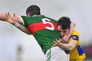 20 January 2023; Dylan Gaughan of Roscommon and Stephen Coen of Mayo tussle off the ball during the Connacht FBD League Final match between Mayo and Roscommon at NUI Galway Connacht GAA Air Dome in Bekan, Mayo. Photo by Piaras Ó Mídheach/Sportsfile