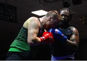 20 January 2023; William J McCartan of Gilford Boxing Club, Down, left, and Daniel Fakoyede of Westside Boxing Club, Dublin, during their super heavyweight 92+kg semi-final bout at the IABA National Elite Boxing Championships semi-finals at the National Boxing Stadium in Dublin. Photo by Seb Daly/Sportsfile